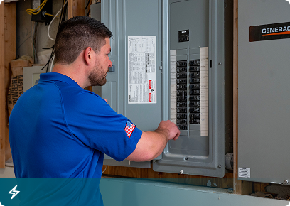 Electrical CTA Electrical services: Academy Air electrician working at an open breaker panel